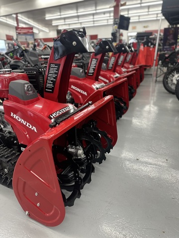 Lineup of Honda track-drive snowblowers and generators inside Hamburg Honda’s showroom in Western New York.